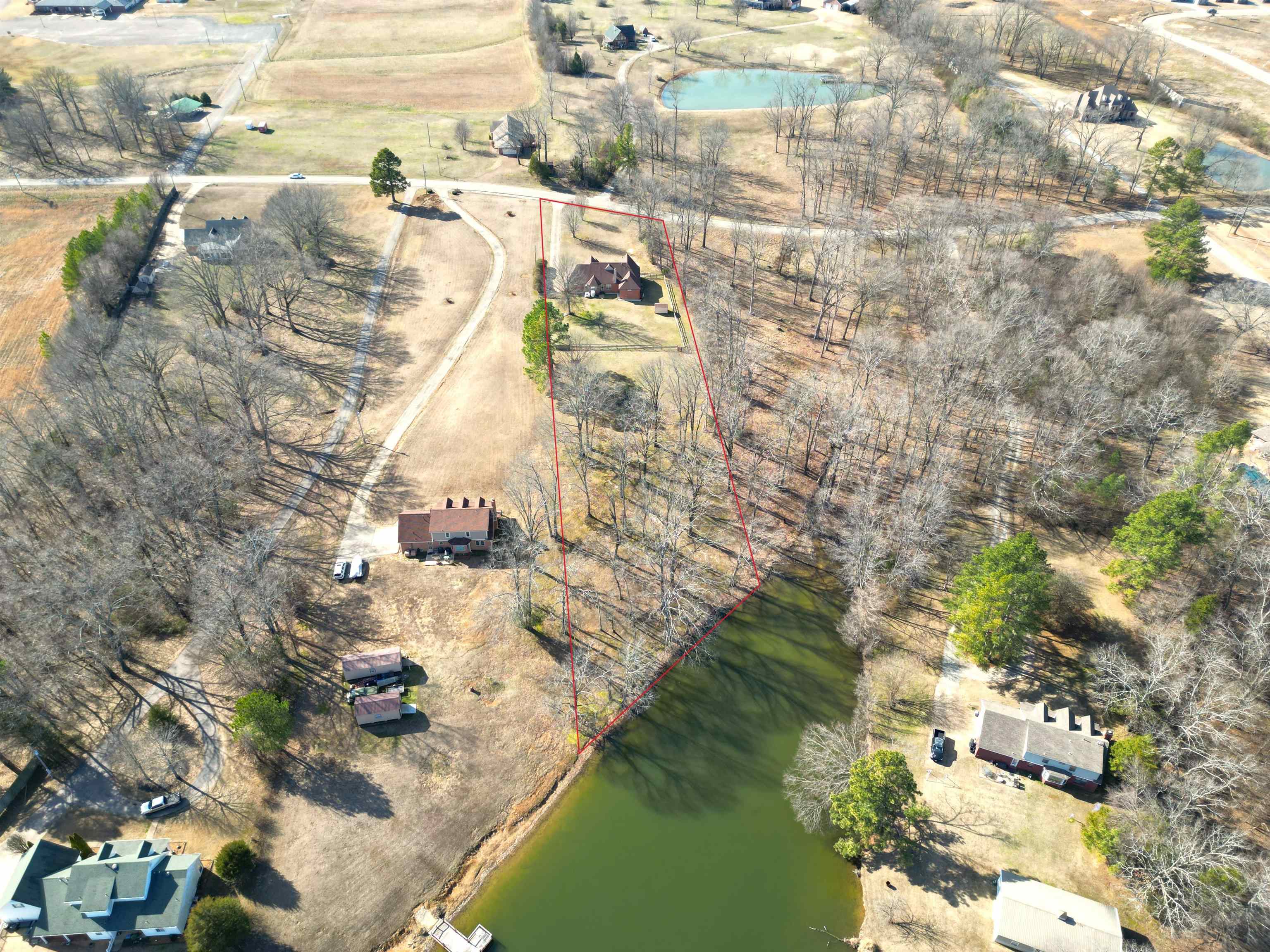 3365 Tomlin Road Somerville, TN 38068 - Photo 2 of 35 Overview of rural landscape with a large body of water and property boundaries highlighted