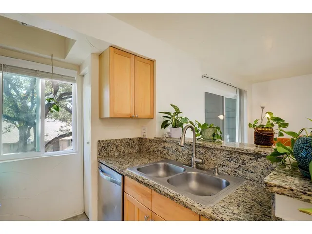 a kitchen with a stove and a microwave