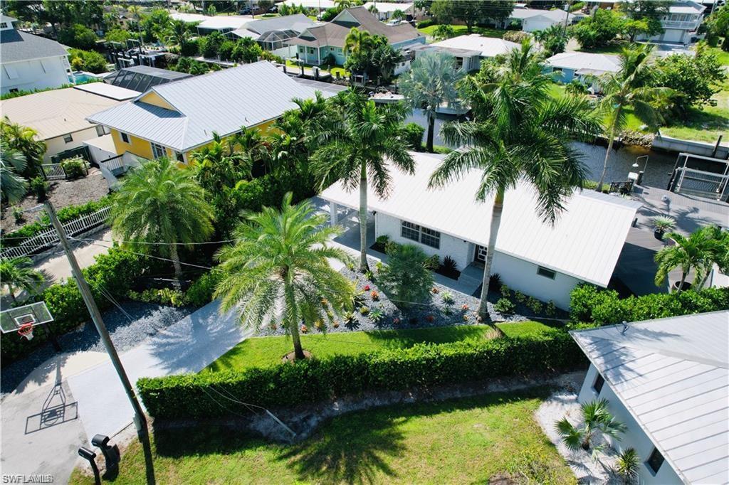 2672 Gulfview Drive Naples, FL 34112 - Photo 11 of 13 a view of a garden