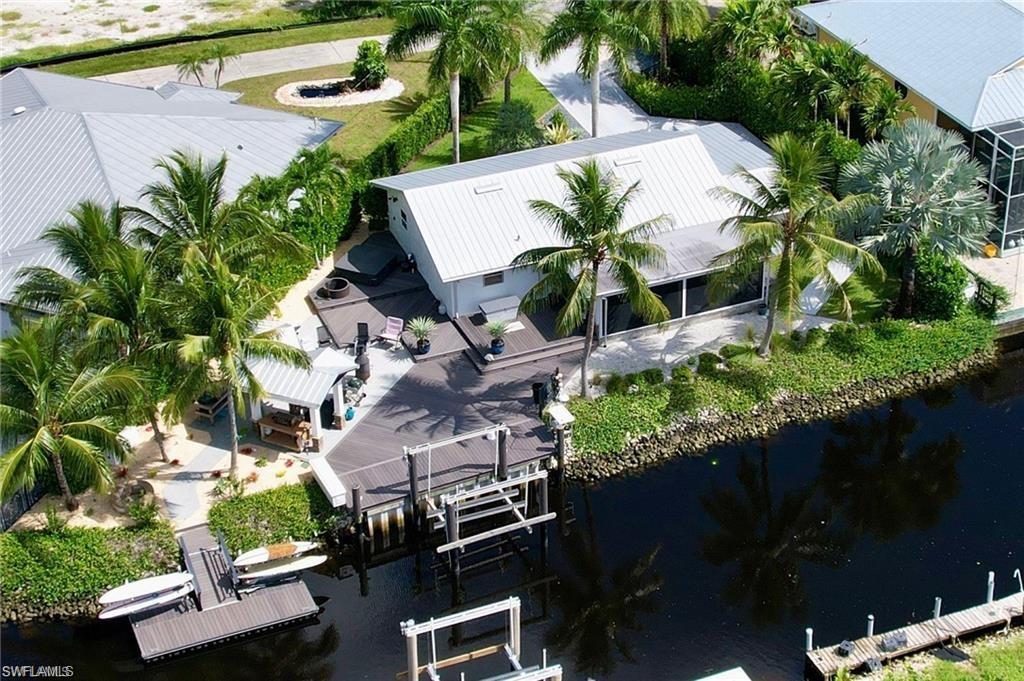2672 Gulfview Drive Naples, FL 34112 - Photo 2 of 13 an aerial view of a house with a yard