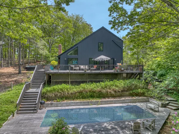 a view of backyard with a garden and entertaining space