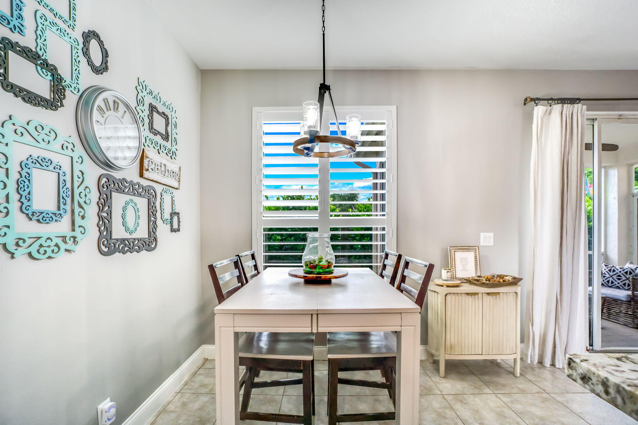 9760 Vineyard Court Boca Raton, FL 33428 - Photo 19 of 75 a view of a dining room with furniture window and wooden floor