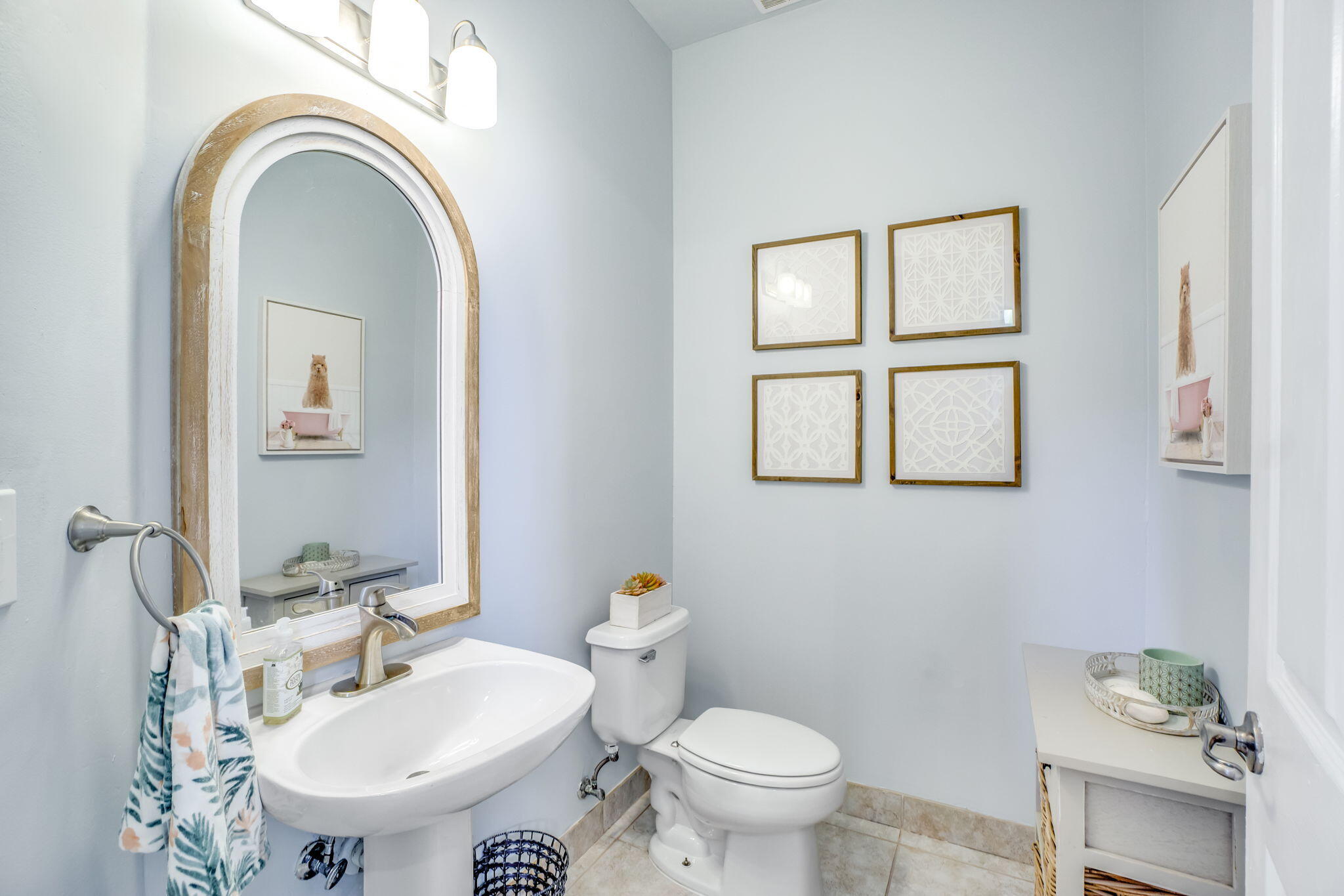 9760 Vineyard Court Boca Raton, FL 33428 - Photo 27 of 75 a bathroom with a toilet a sink and mirror