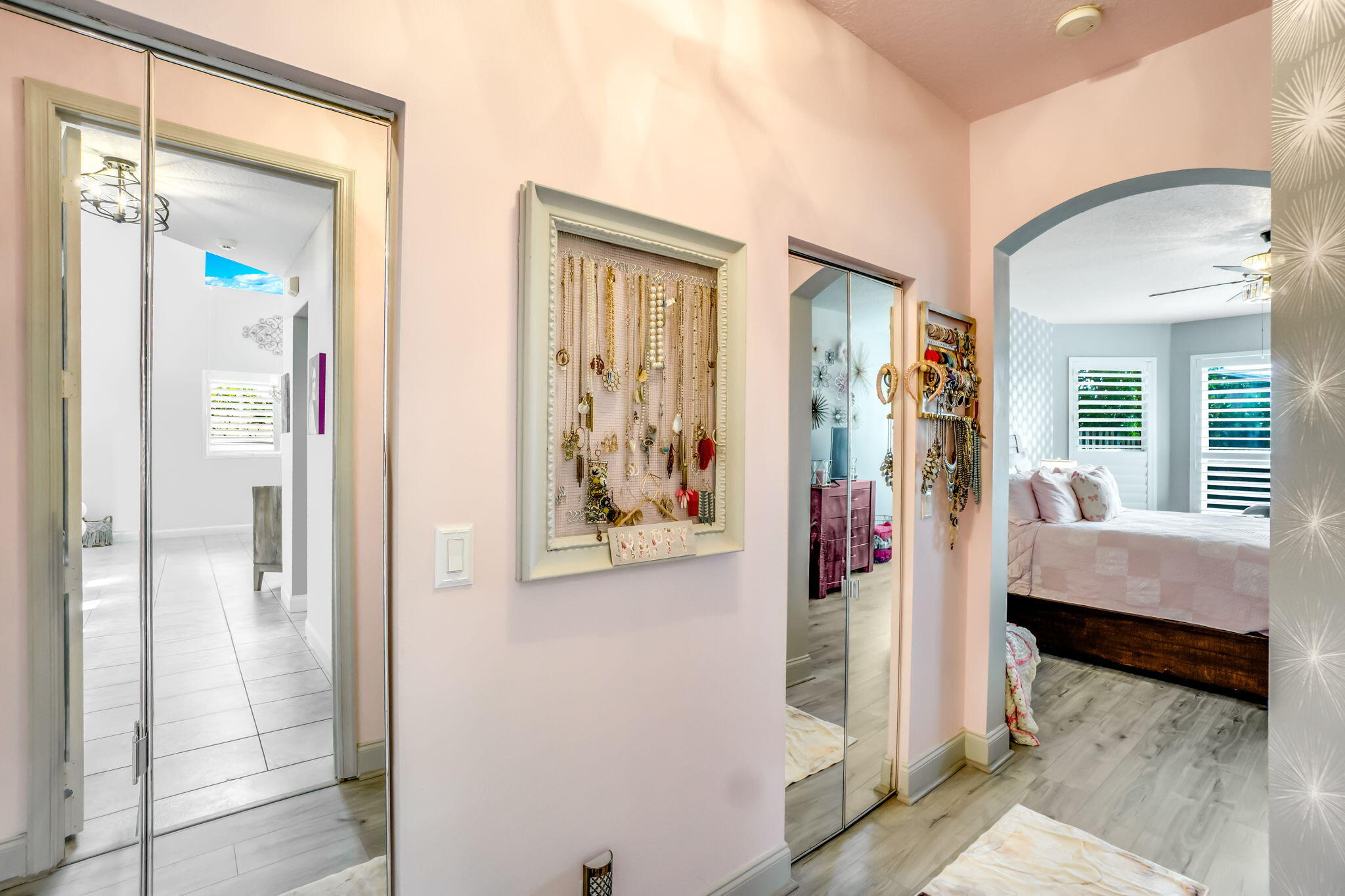 9760 Vineyard Court Boca Raton, FL 33428 - Photo 28 of 75 a view of a bedroom with wooden floor and windows