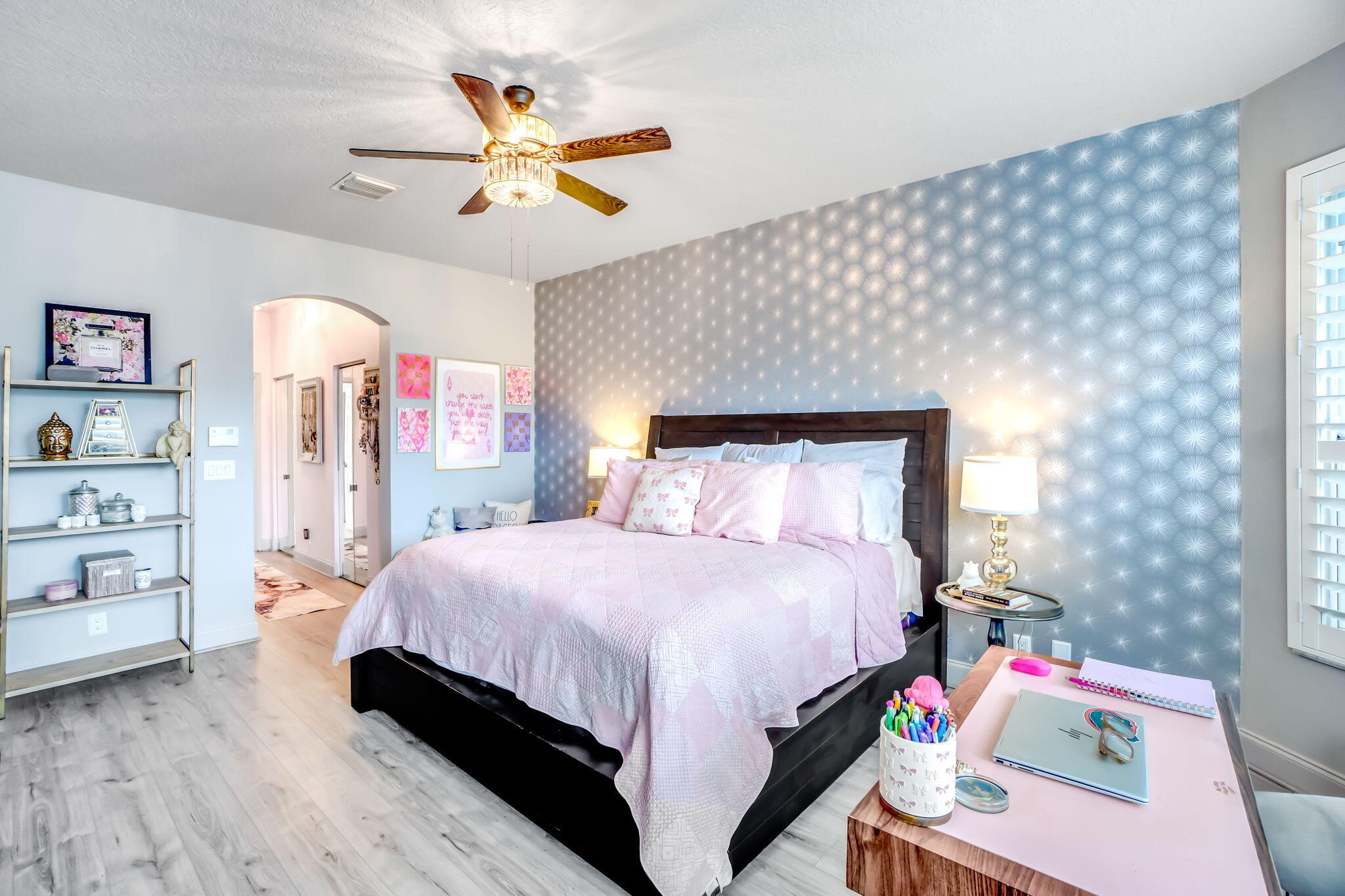 9760 Vineyard Court Boca Raton, FL 33428 - Photo 31 of 75 a bedroom with a bed and a chandelier