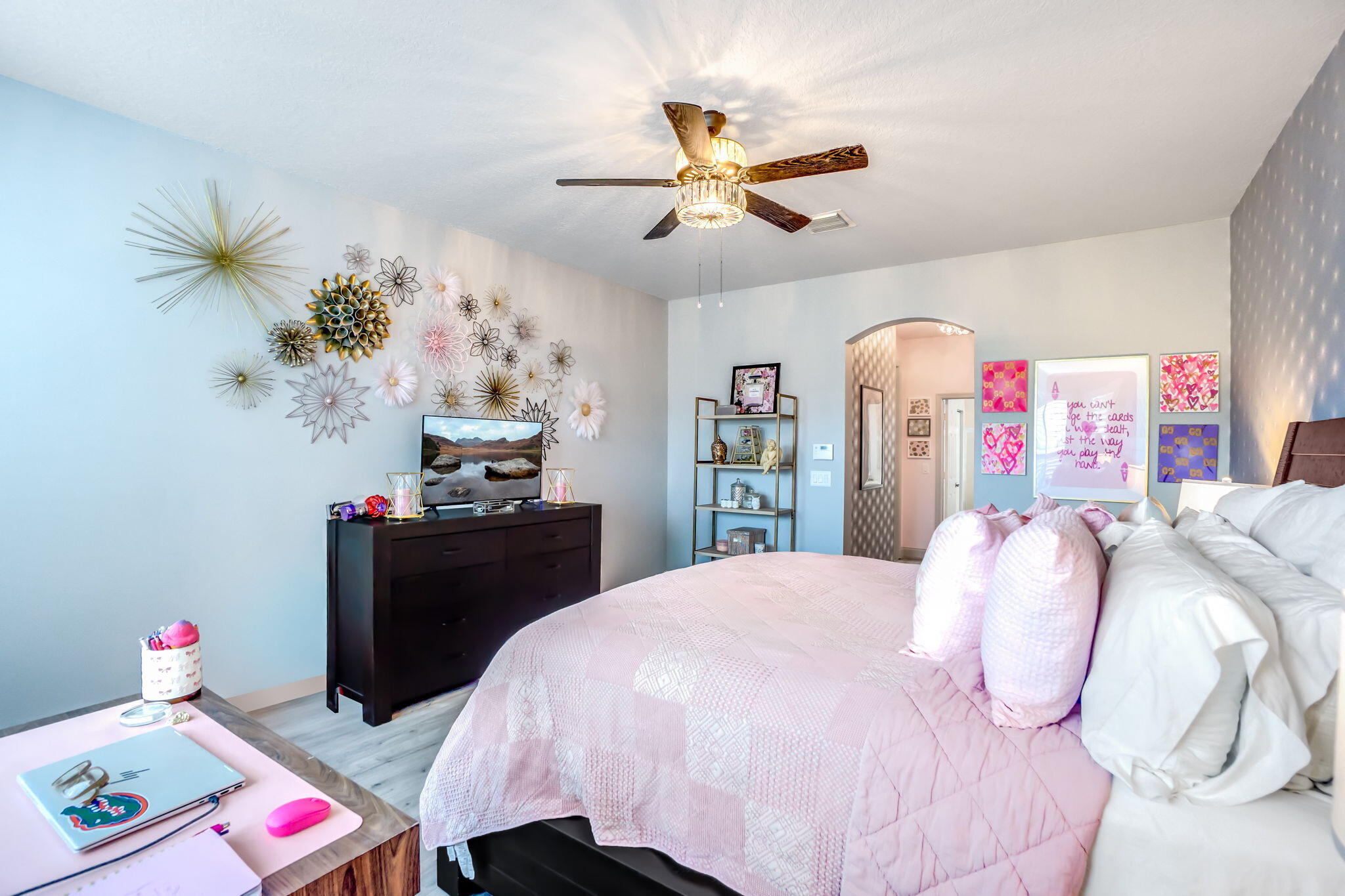 9760 Vineyard Court Boca Raton, FL 33428 - Photo 33 of 75 a bedroom with a bed and a chandelier