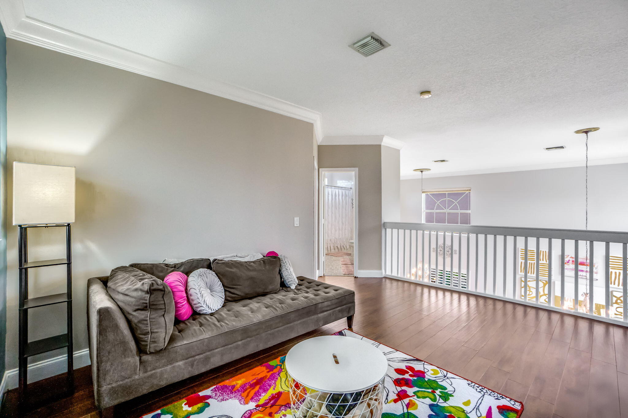 9760 Vineyard Court Boca Raton, FL 33428 - Photo 38 of 75 a living room with furniture and a wooden floor