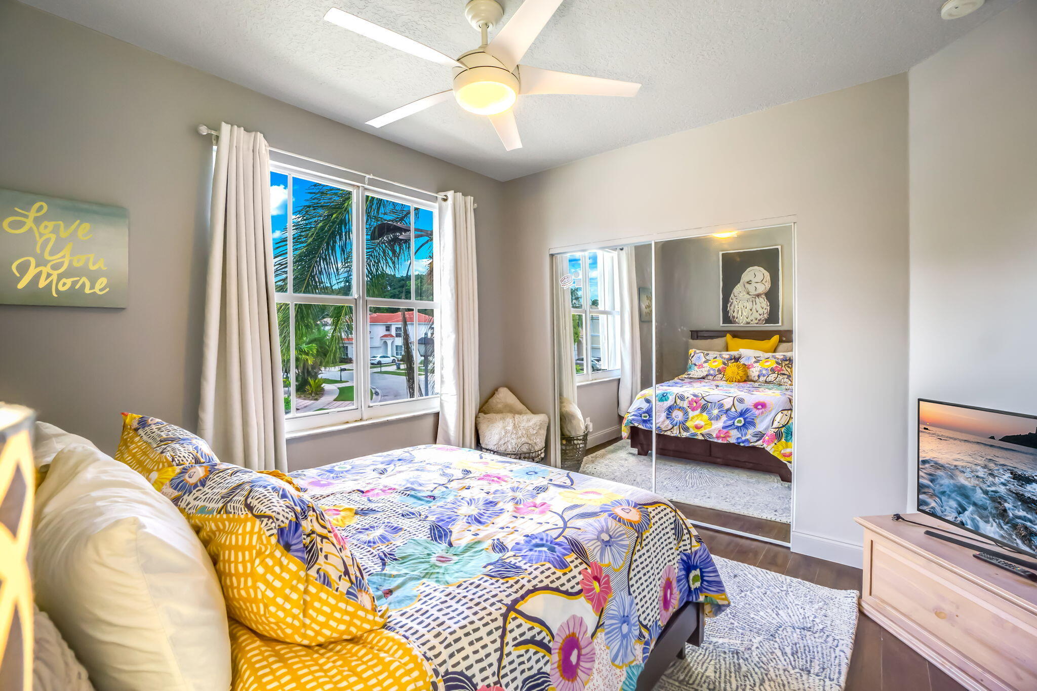 9760 Vineyard Court Boca Raton, FL 33428 - Photo 43 of 75 a bedroom with bed and windows