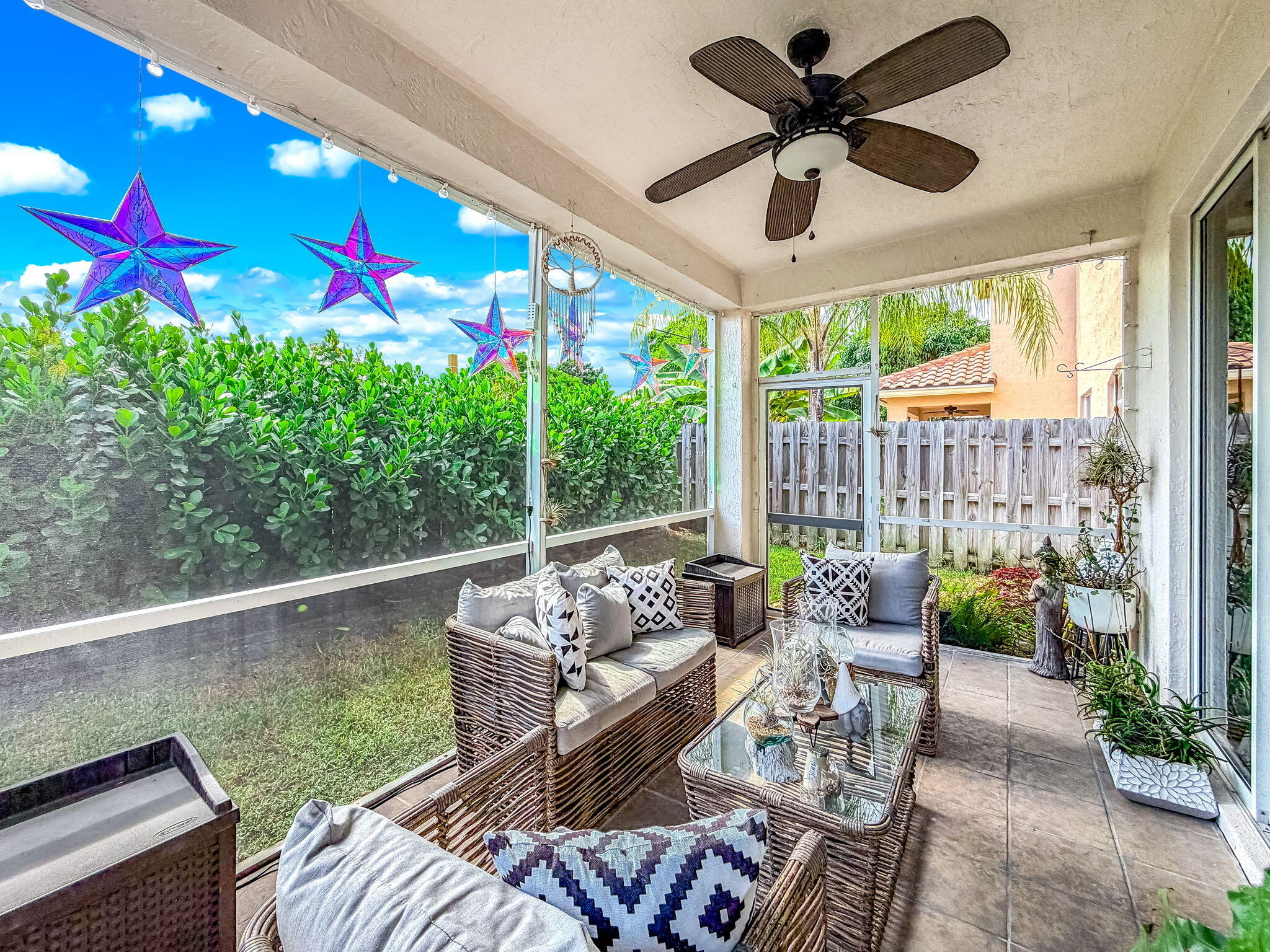 9760 Vineyard Court Boca Raton, FL 33428 - Photo 50 of 75 a balcony with furniture and a potted plant