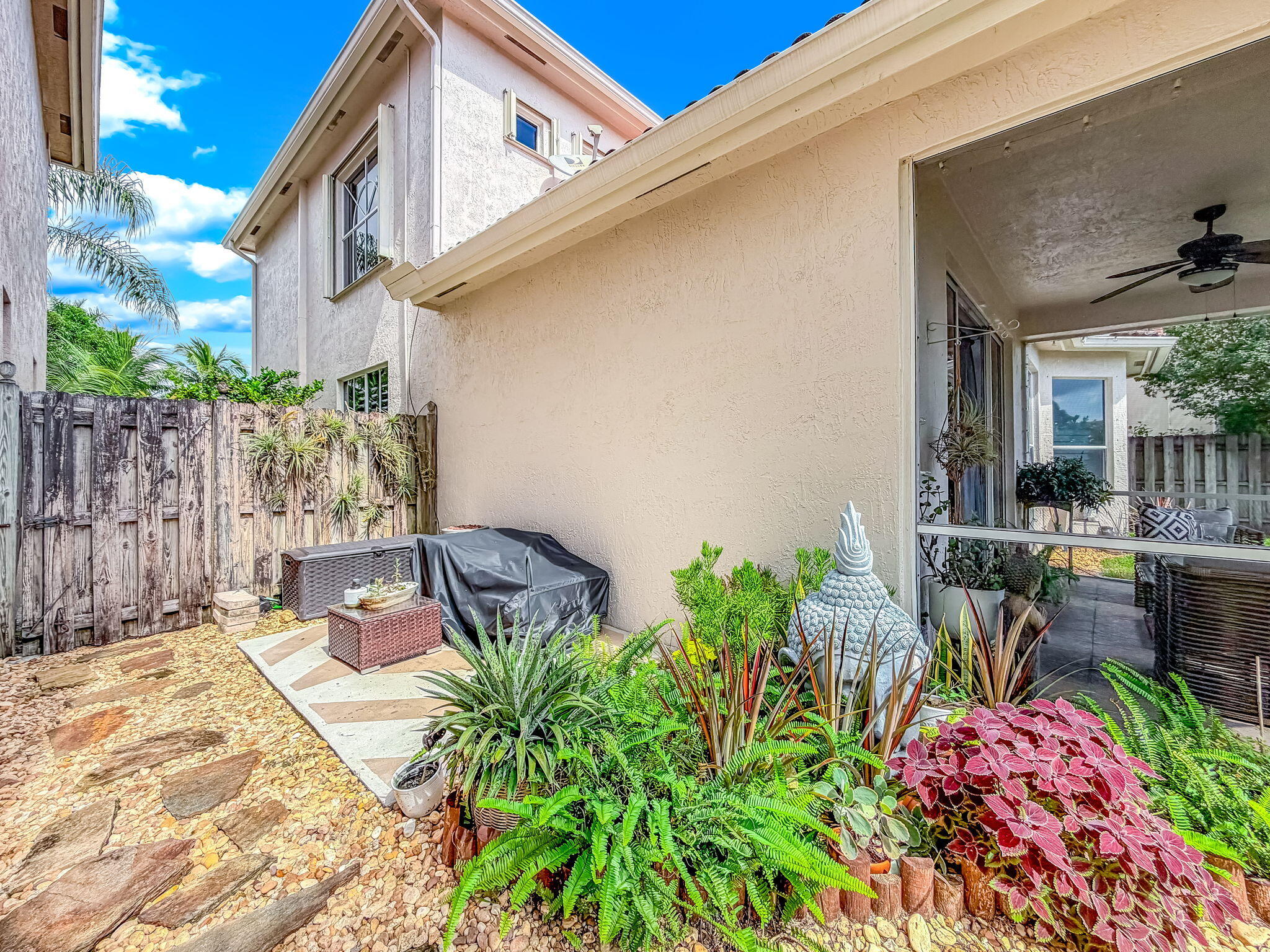 9760 Vineyard Court Boca Raton, FL 33428 - Photo 52 of 75 a view of yard with patio