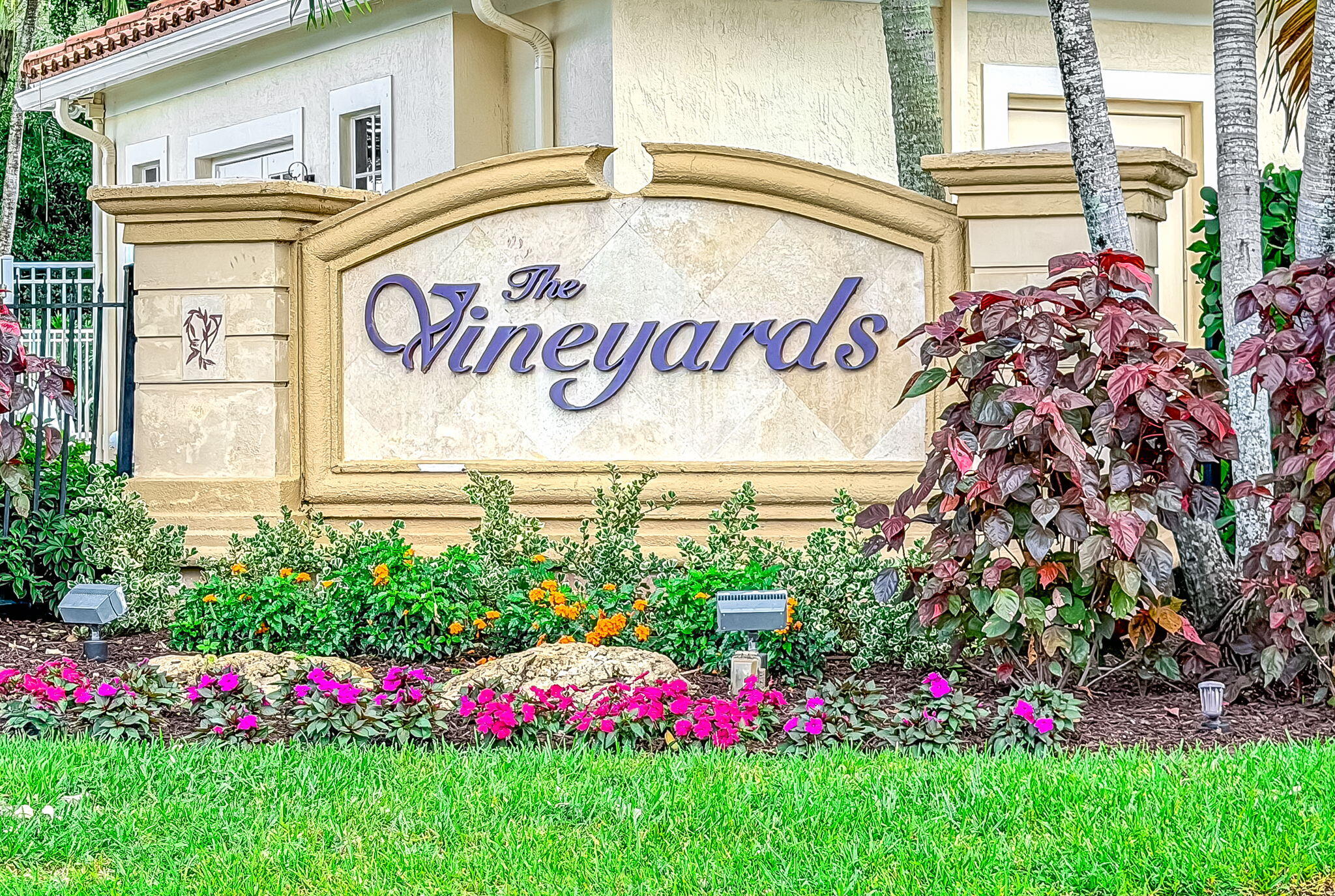 9760 Vineyard Court Boca Raton, FL 33428 - Photo 57 of 75 a sign on the side of a building