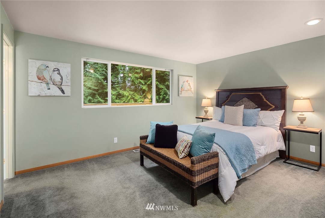22918 38th Avenue Southeast Bothell, WA 98021 - Photo 12 of 28 a bedroom with a bed and window