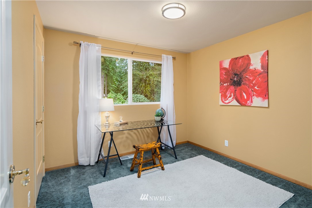 22918 38th Avenue Southeast Bothell, WA 98021 - Photo 15 of 28 a workspace room with furniture and windows