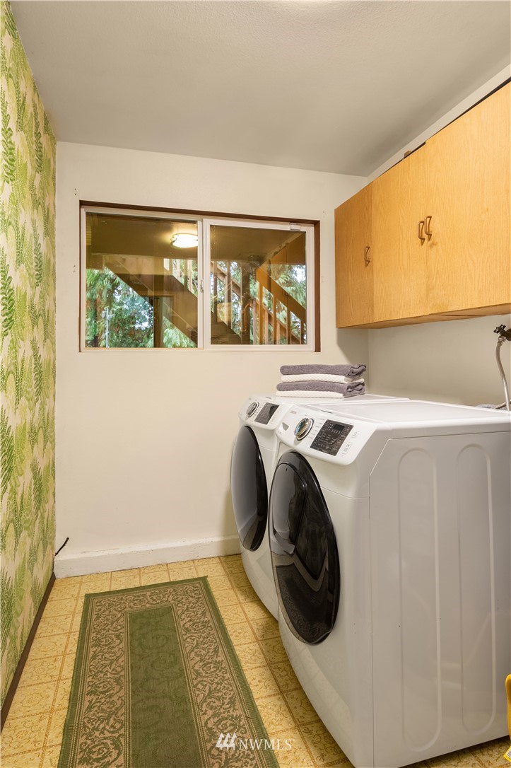 22918 38th Avenue Southeast Bothell, WA 98021 - Photo 20 of 28 a utility room with sink dryer and washer
