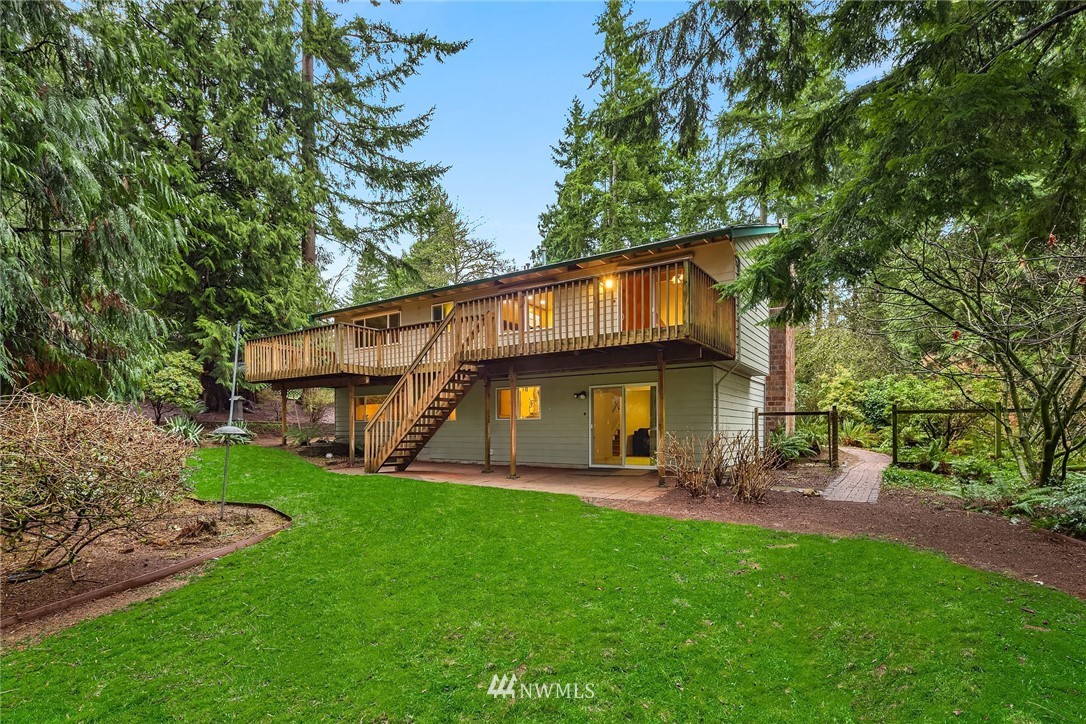 22918 38th Avenue Southeast Bothell, WA 98021 - Photo 23 of 28 a view of a house with a yard and sitting area