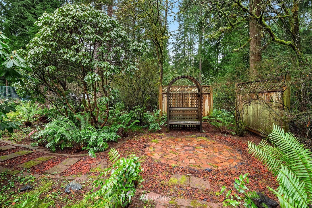 22918 38th Avenue Southeast Bothell, WA 98021 - Photo 24 of 28 a view of a house with a small yard and a tree
