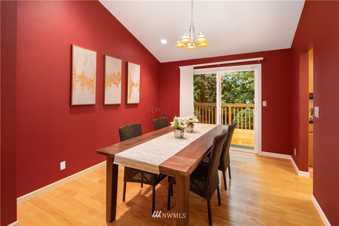 22918 38th Avenue Southeast Bothell, WA 98021 - Photo 6 of 28 a view of a dining room with furniture window and outside view