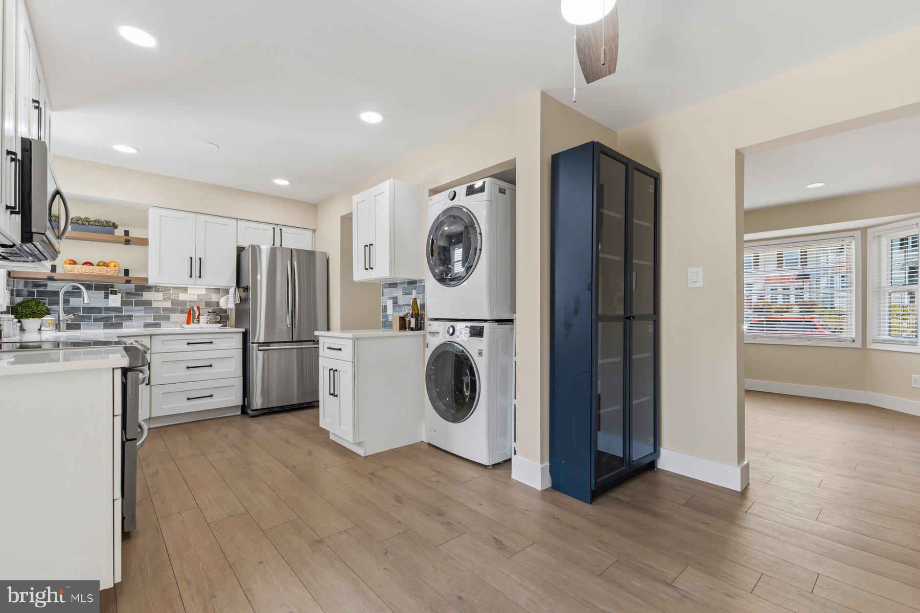 6028 Sweet Dale Court Springfield, VA 22152 - Photo 13 of 29 a view of kitchen with refrigerator and microwave
