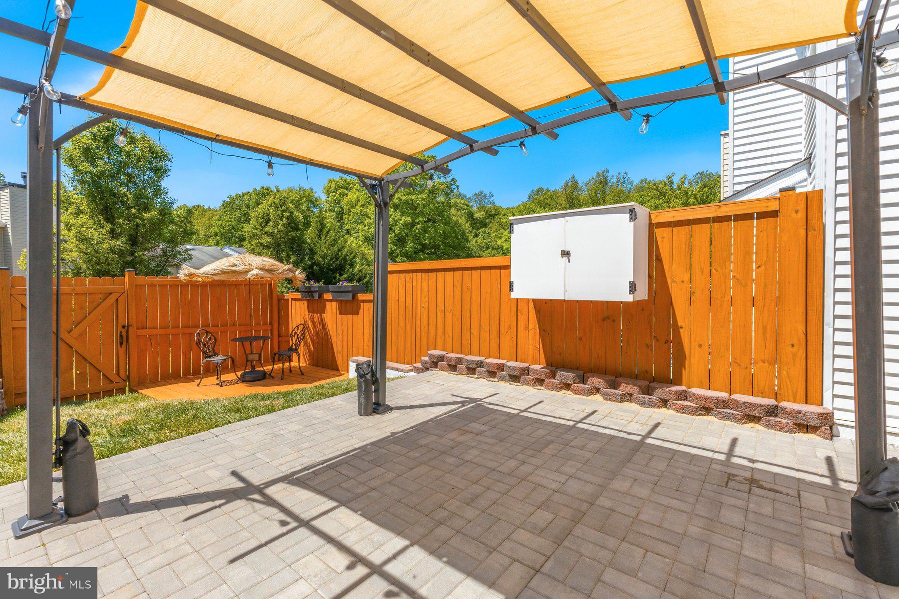 6028 Sweet Dale Court Springfield, VA 22152 - Photo 26 of 29 a backyard of a house with a basket ball court
