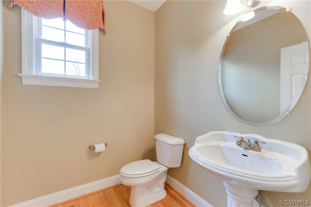1531 Winterfield Road Midlothian, VA 23113 - Photo 6 of 42 a bathroom with a sink and a mirror