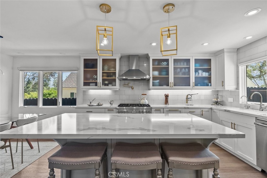 2534 Page Drive Altadena, CA 91001 - Photo 11 of 48 a kitchen with a sink and chairs