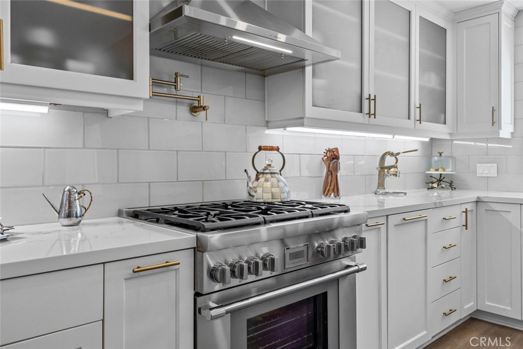 2534 Page Drive Altadena, CA 91001 - Photo 17 of 48 a stove top oven sitting inside of a kitchen