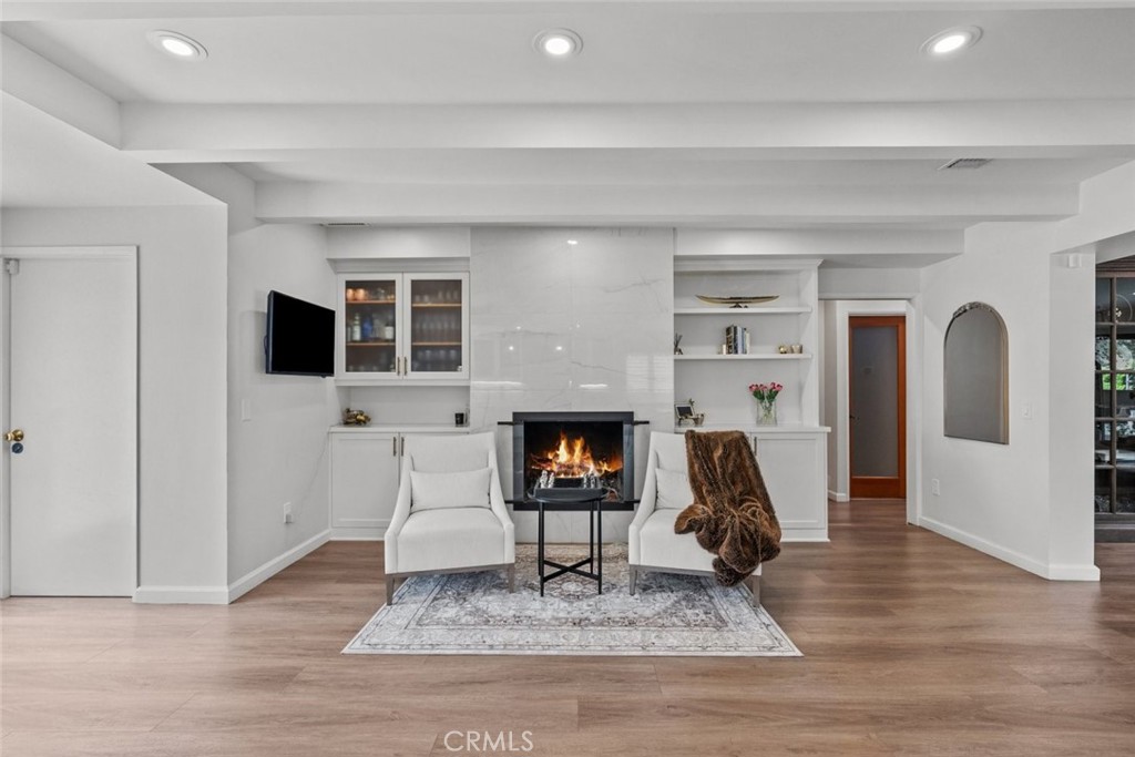 2534 Page Drive Altadena, CA 91001 - Photo 19 of 48 a living room with furniture and a fireplace