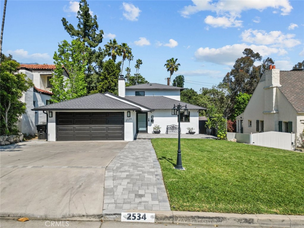 2534 Page Drive Altadena, CA 91001 - Photo 2 of 48 front view of a house with a yard