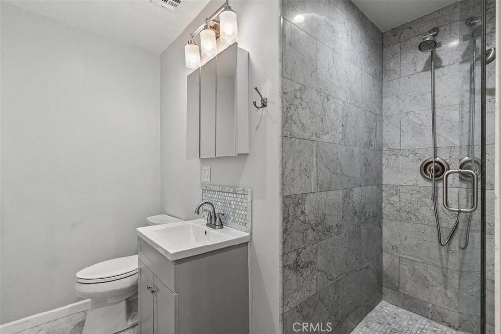 2534 Page Drive Altadena, CA 91001 - Photo 29 of 48 a bathroom with a sink toilet and shower