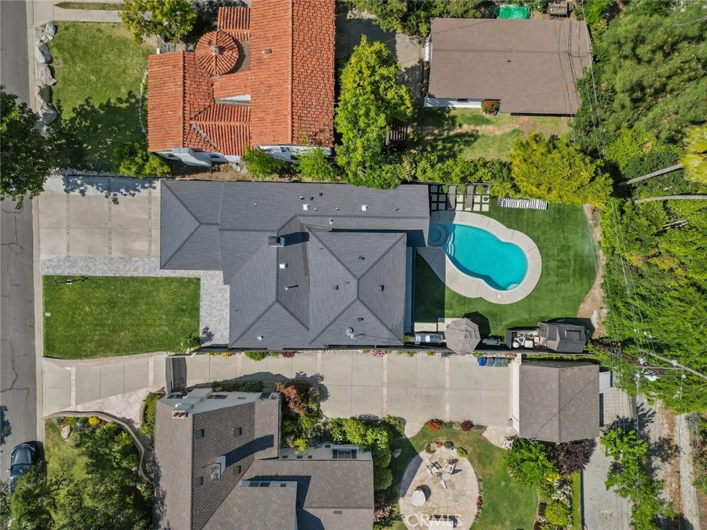 2534 Page Drive Altadena, CA 91001 - Photo 3 of 48 an aerial view of a house with a yard and pool
