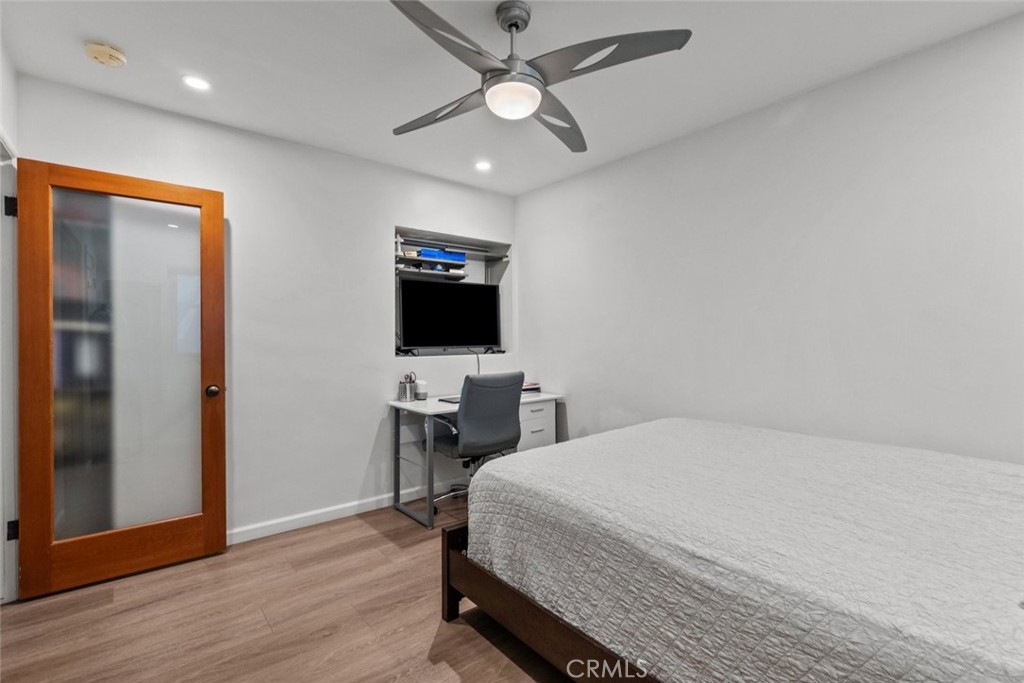 2534 Page Drive Altadena, CA 91001 - Photo 31 of 48 a bedroom with a bed and a flat screen tv