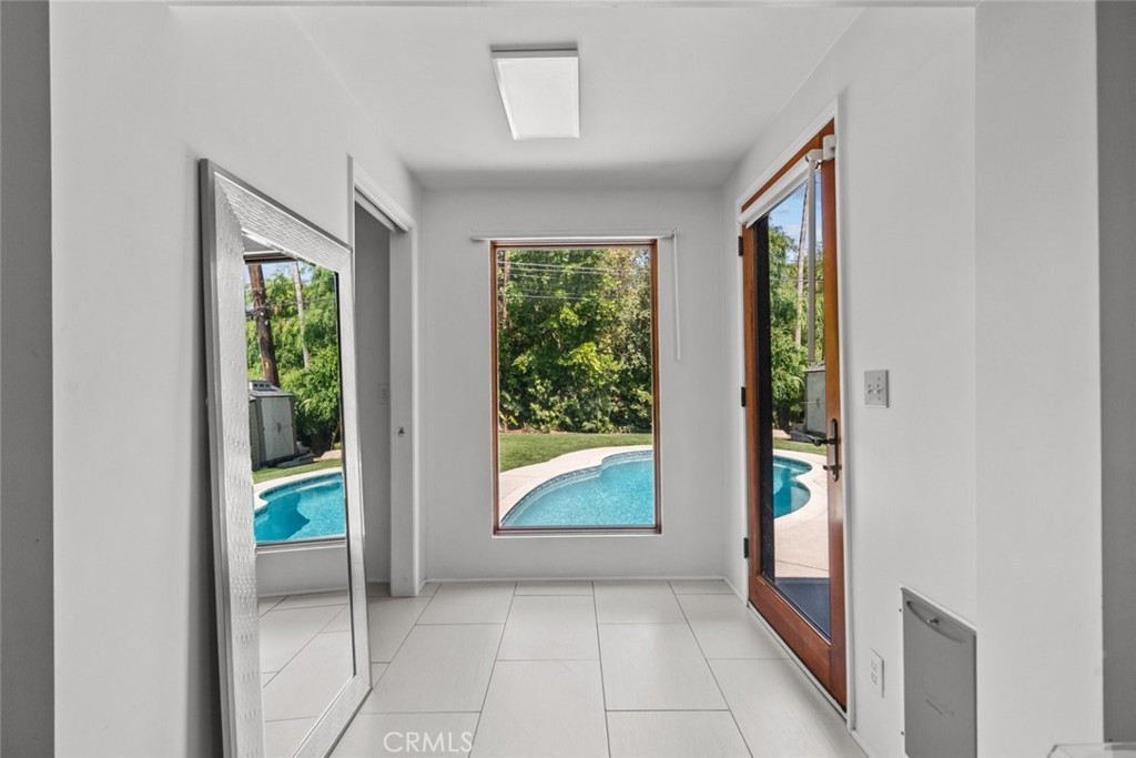 2534 Page Drive Altadena, CA 91001 - Photo 34 of 48 a view of an entryway with wooden floor and windows