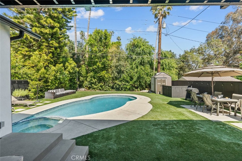 2534 Page Drive Altadena, CA 91001 - Photo 44 of 48 a view of a swimming pool with a patio