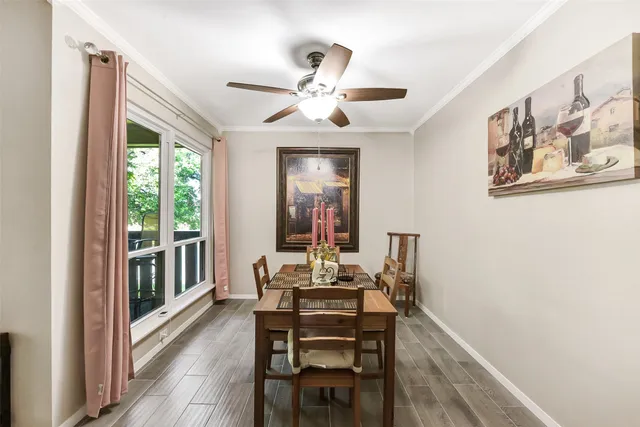 a view of a dining room with furniture window and outside view