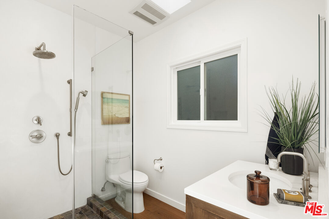 1314 Preston Way Venice, CA 90291 - Photo 23 of 37 a bathroom with a sink toilet and shower