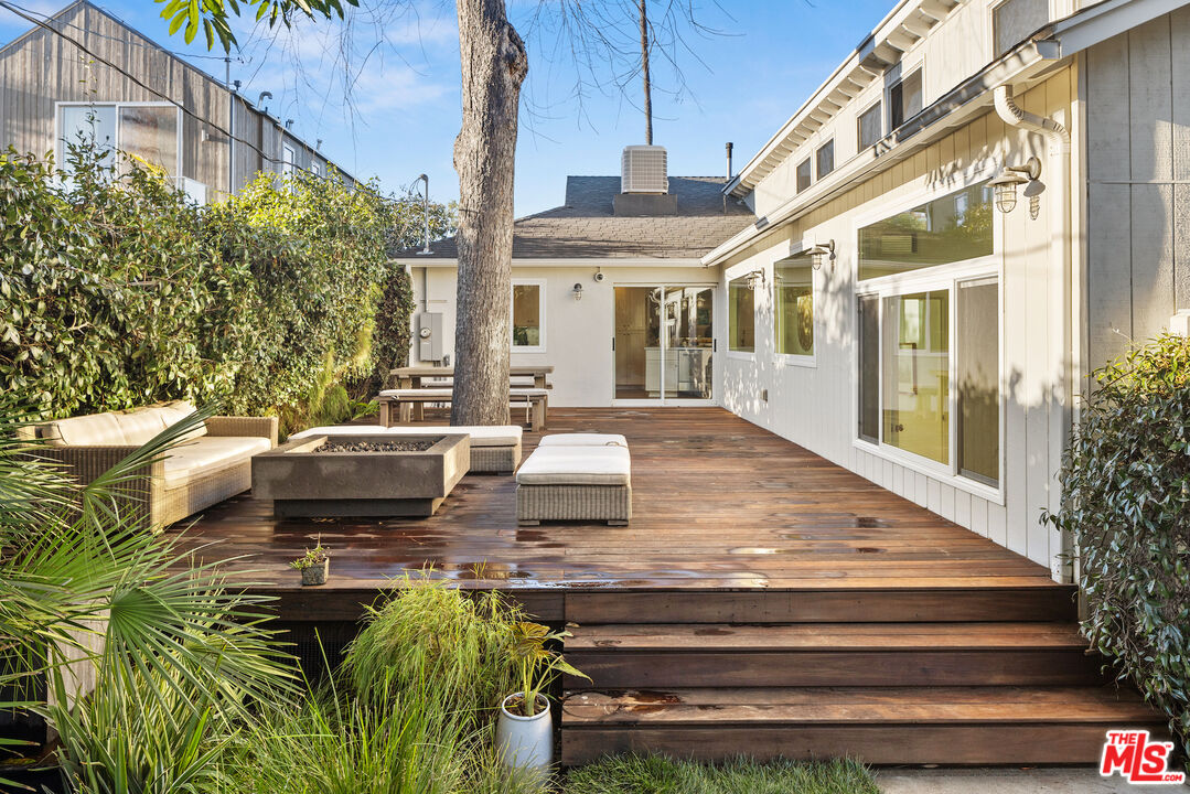1314 Preston Way Venice, CA 90291 - Photo 25 of 37 a view of a patio with couches table and chairs and potted plants