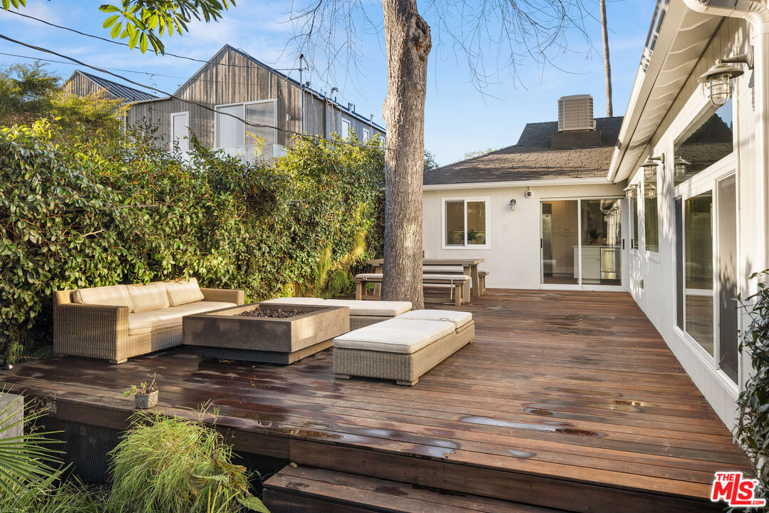 1314 Preston Way Venice, CA 90291 - Photo 26 of 37 a view of a patio with couches table and chairs and potted plants