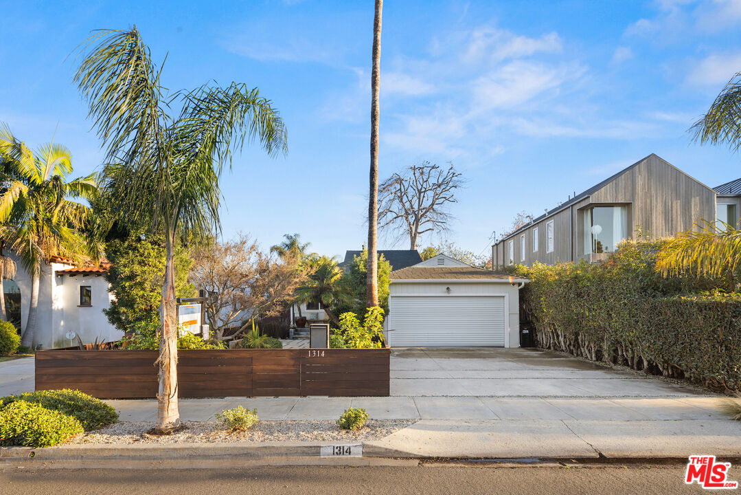 1314 Preston Way Venice, CA 90291 - Photo 34 of 37 a front view of a house with a yard and garage