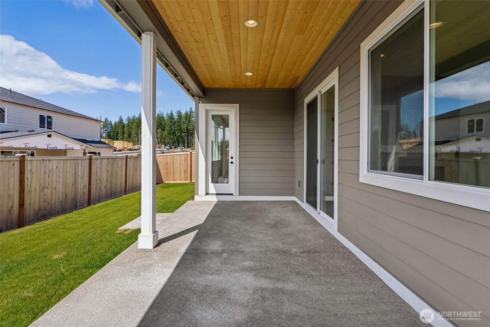 4142 Southwest Muller Lane, Unit 310 Port Orchard, WA 98367 - Photo 14 of 14 a view of a backyard with garden
