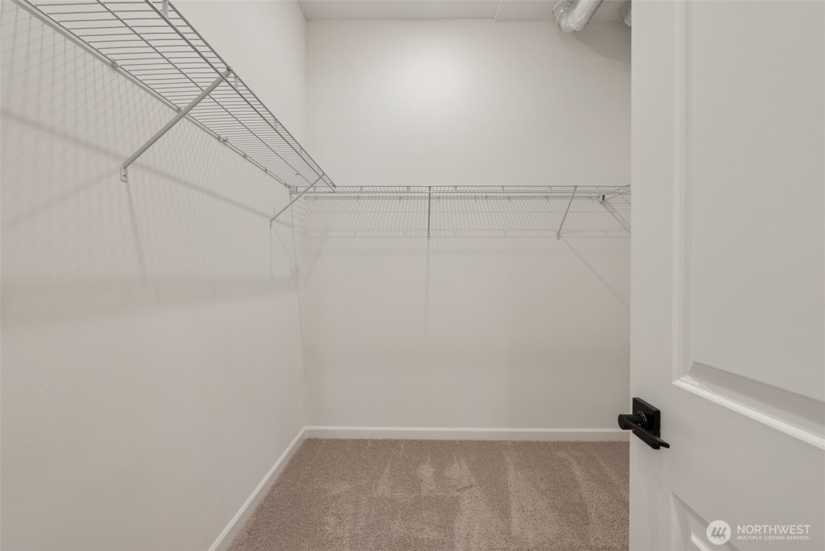 4142 Southwest Muller Lane, Unit 310 Port Orchard, WA 98367 - Photo 10 of 14 a view of small space with racks on the wall