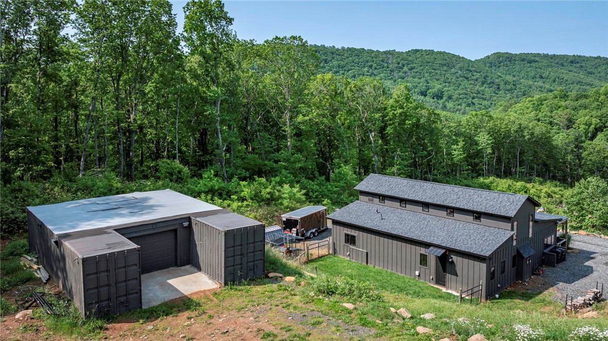 509 Grant Houck Road Todd, NC 28684 - Photo 8 of 43 an aerial view of a house with pool table and chairs