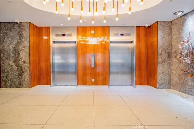a view of a living room and kitchen