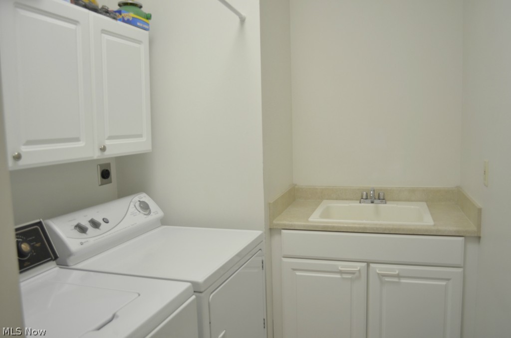 35780 Mills Road Avon, OH 44011 - Photo 14 of 24 First floor laundry right off the garage entry - perfect place to contain the dirty soccer socks or garden mud before moving into the rest of the home.