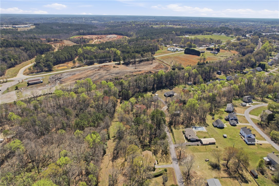 0 Springdale Avenue Liberty, SC 29657 - Photo 8 of 12 This elevated perspective showcases expansive land with residential pockets and natural surroundings.