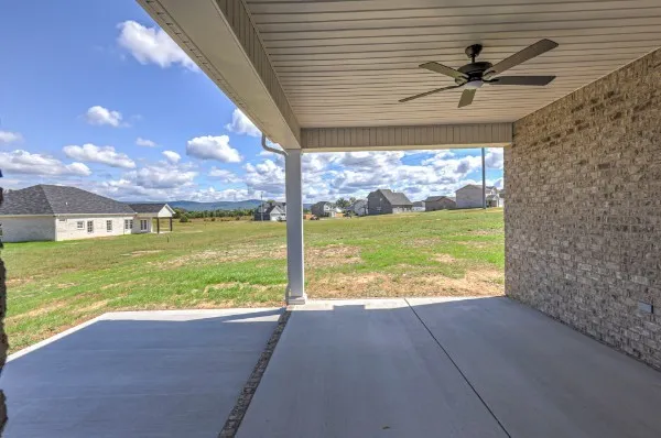 a view of an ocean from a ceiling fan