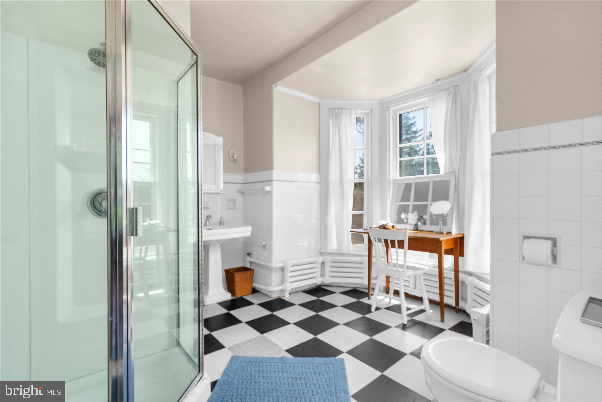 5358 York Road Doylestown, PA 18902 - Photo 22 of 61 a bathroom with a sink a toilet and shower