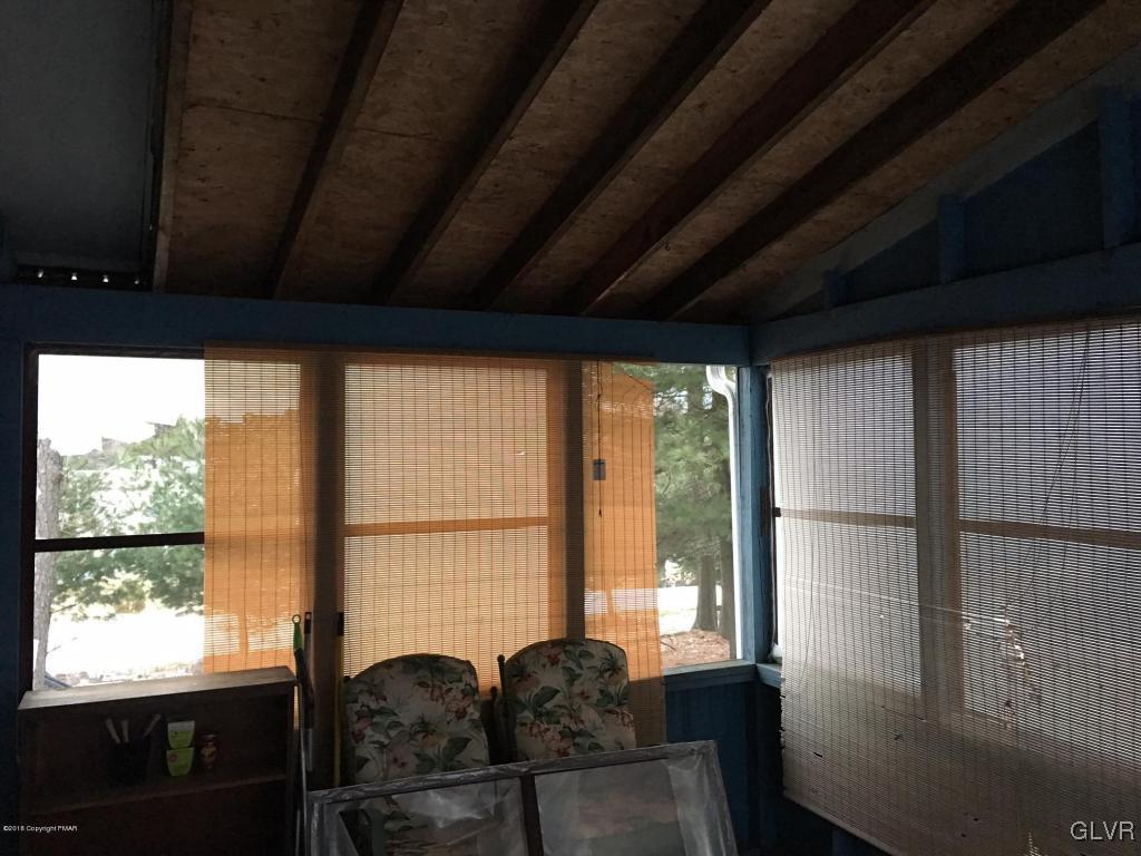 1568 Clover Road Long Pond, PA 18334 - Photo 5 of 14 a view of a living room and a large window