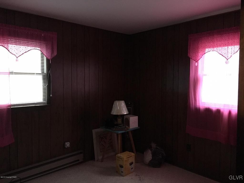 1568 Clover Road Long Pond, PA 18334 - Photo 10 of 14 a room with a window and furniture