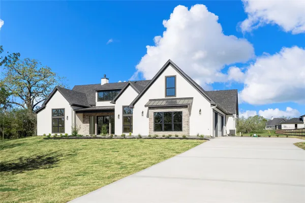 a view of a room with a large window