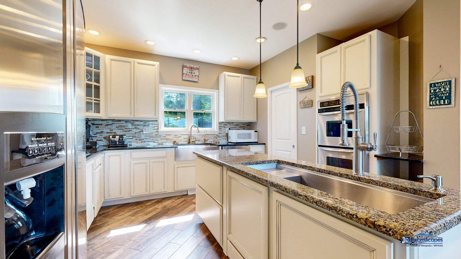 35142 North Lk Shr Road Ingleside, IL 60041 - Photo 10 of 60 a kitchen with granite countertop a sink a counter top space stainless steel appliances and cabinets